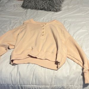 light pinky/orange half button cropped sweater